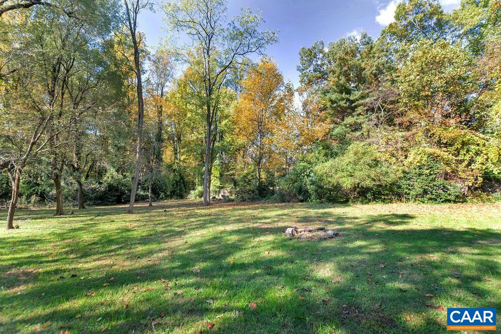 301 Georgetown Lane Charlottesville, VA 22901 - Photo 29 of 39 a view of a green field with trees in the background