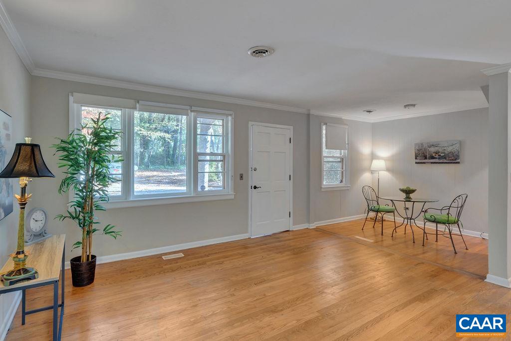 301 Georgetown Lane Charlottesville, VA 22901 - Photo 3 of 39 a view of a livingroom with furniture and a window