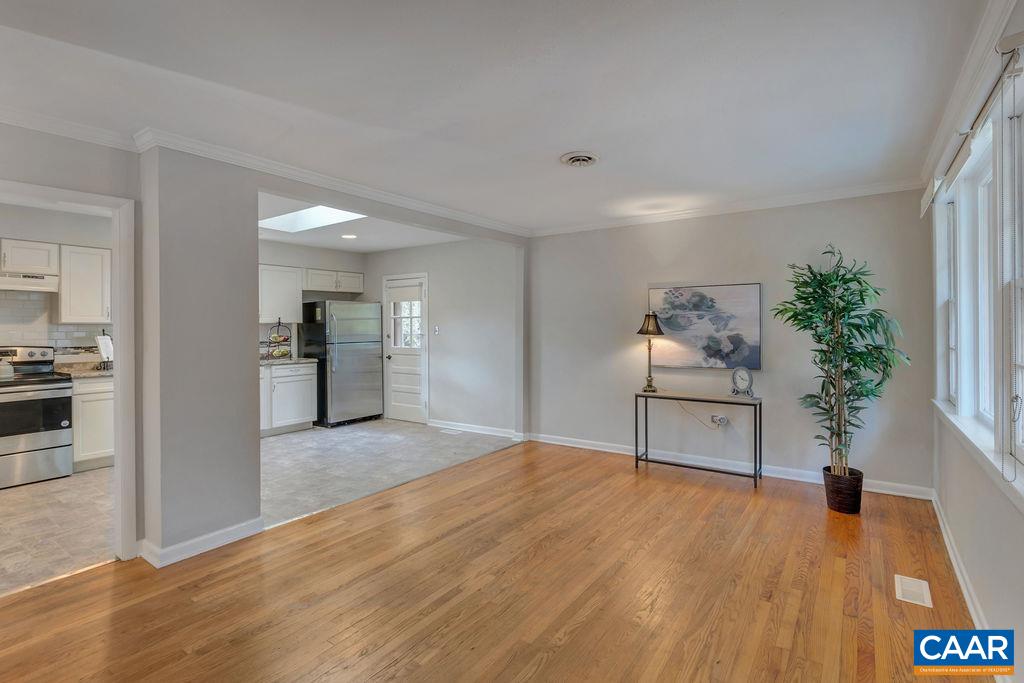 301 Georgetown Lane Charlottesville, VA 22901 - Photo 4 of 39 a view of livingroom with furniture and floor to ceiling window