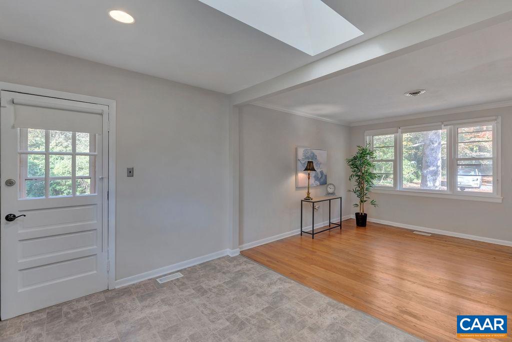 301 Georgetown Lane Charlottesville, VA 22901 - Photo 8 of 39 wooden floor in an empty room with a window
