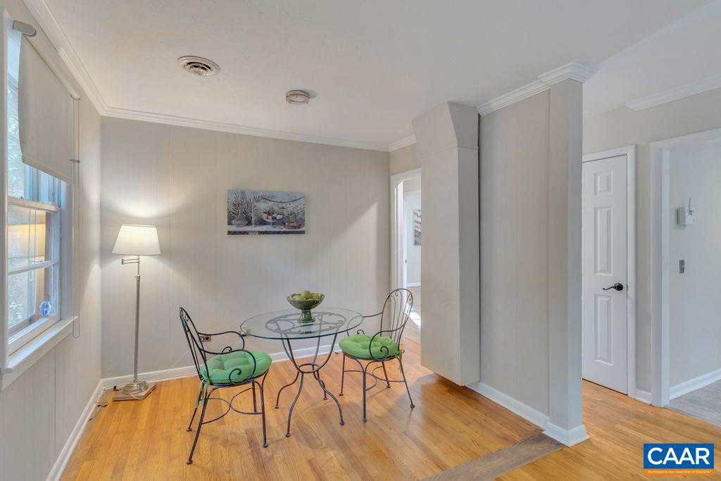 301 Georgetown Lane Charlottesville, VA 22901 - Photo 10 of 39 a view of a dining room with furniture and wooden floor
