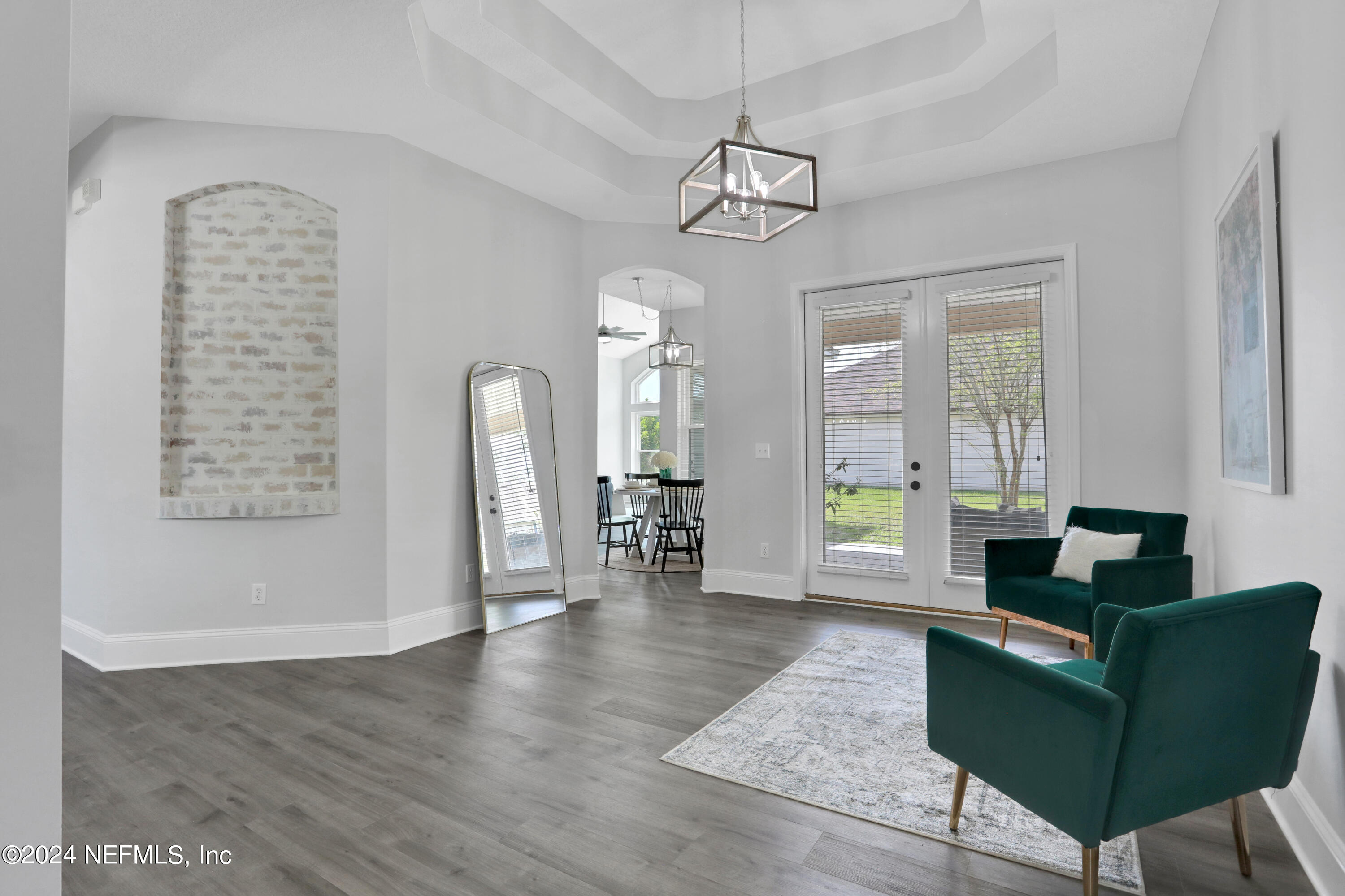 346 Porta Rosa Circle St. Augustine, FL 32092 - Photo 11 of 53 a living room with furniture and wooden floor
