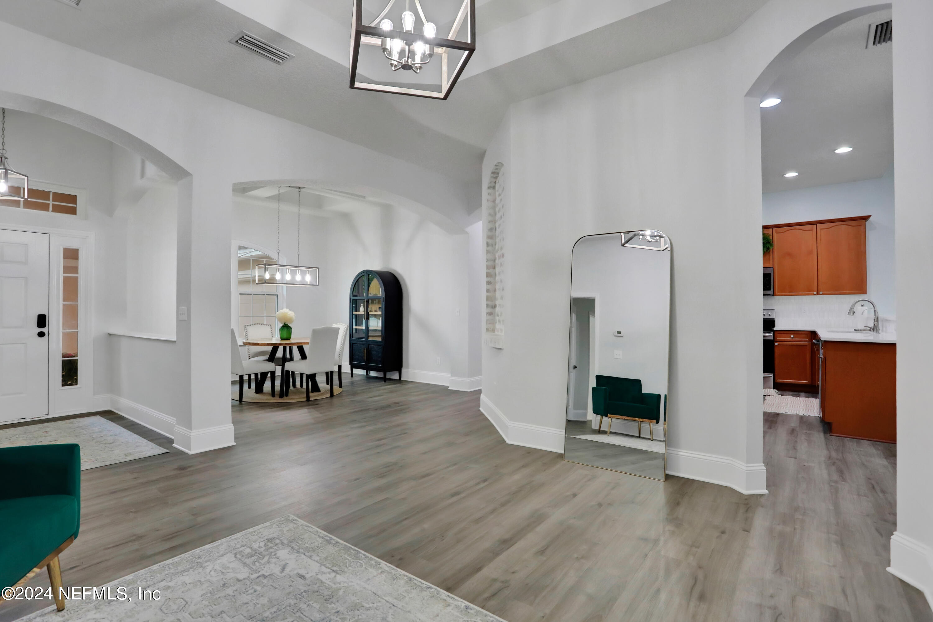 346 Porta Rosa Circle St. Augustine, FL 32092 - Photo 13 of 53 a view of a room with wooden floor and furniture