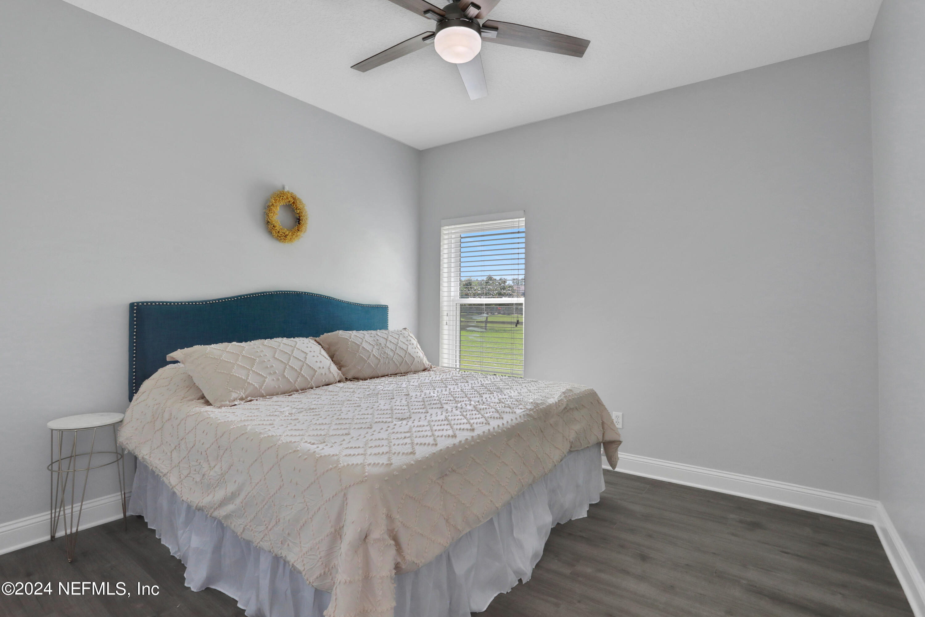 346 Porta Rosa Circle St. Augustine, FL 32092 - Photo 28 of 53 a bedroom with a bed and a window
