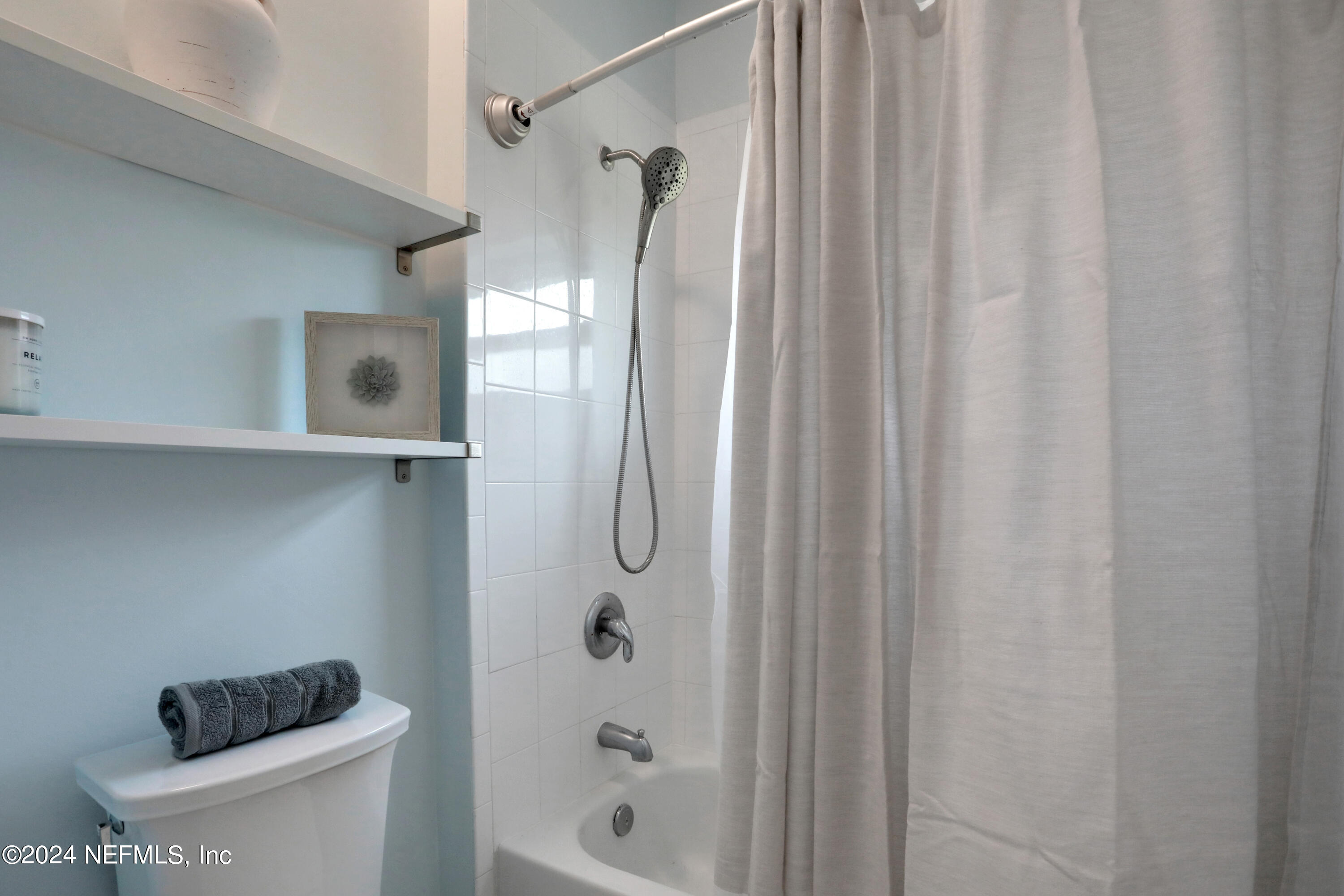 346 Porta Rosa Circle St. Augustine, FL 32092 - Photo 33 of 53 a bathroom with a shower and a toilet