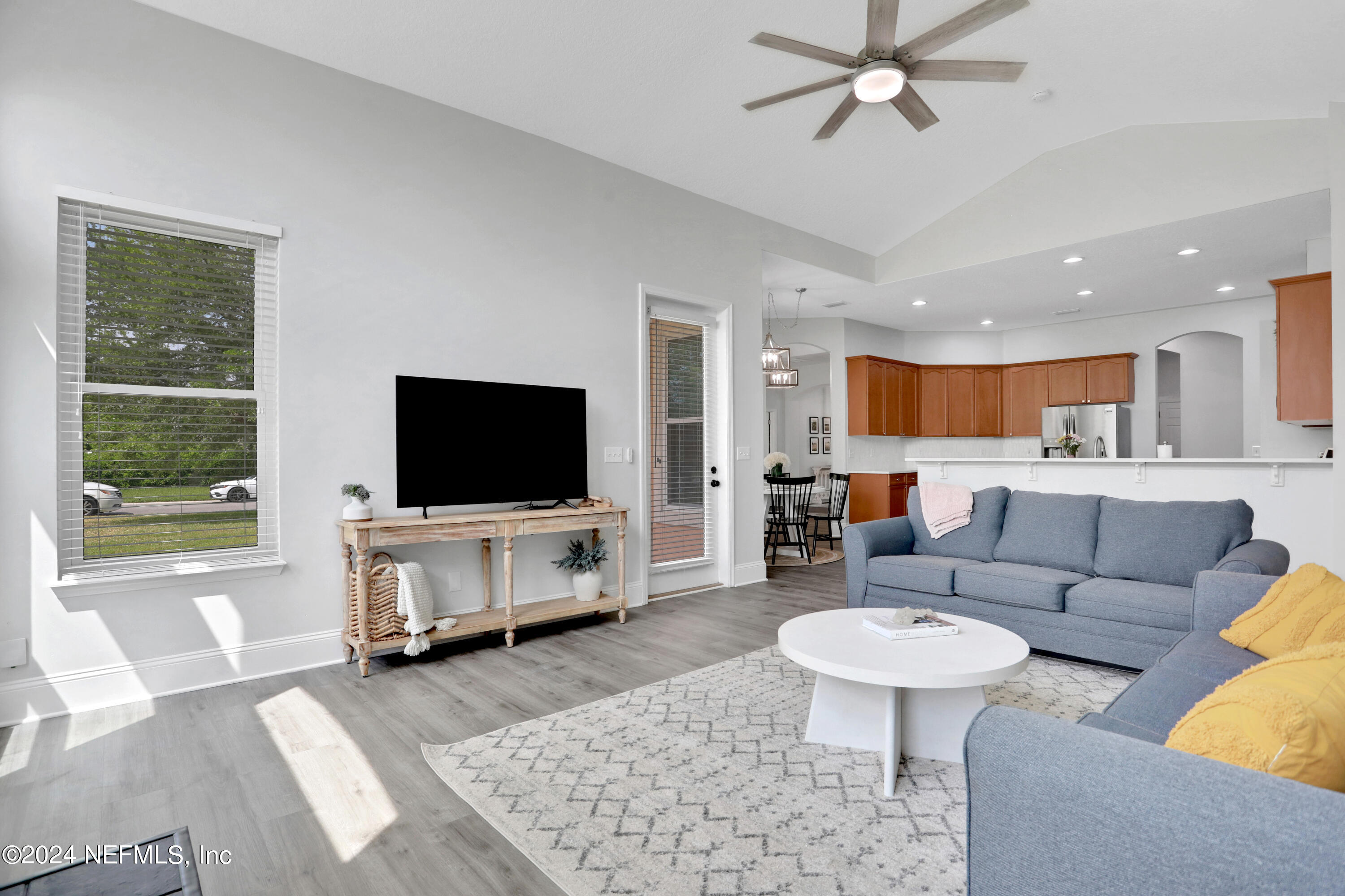 346 Porta Rosa Circle St. Augustine, FL 32092 - Photo 4 of 53 a living room with furniture and a flat screen tv