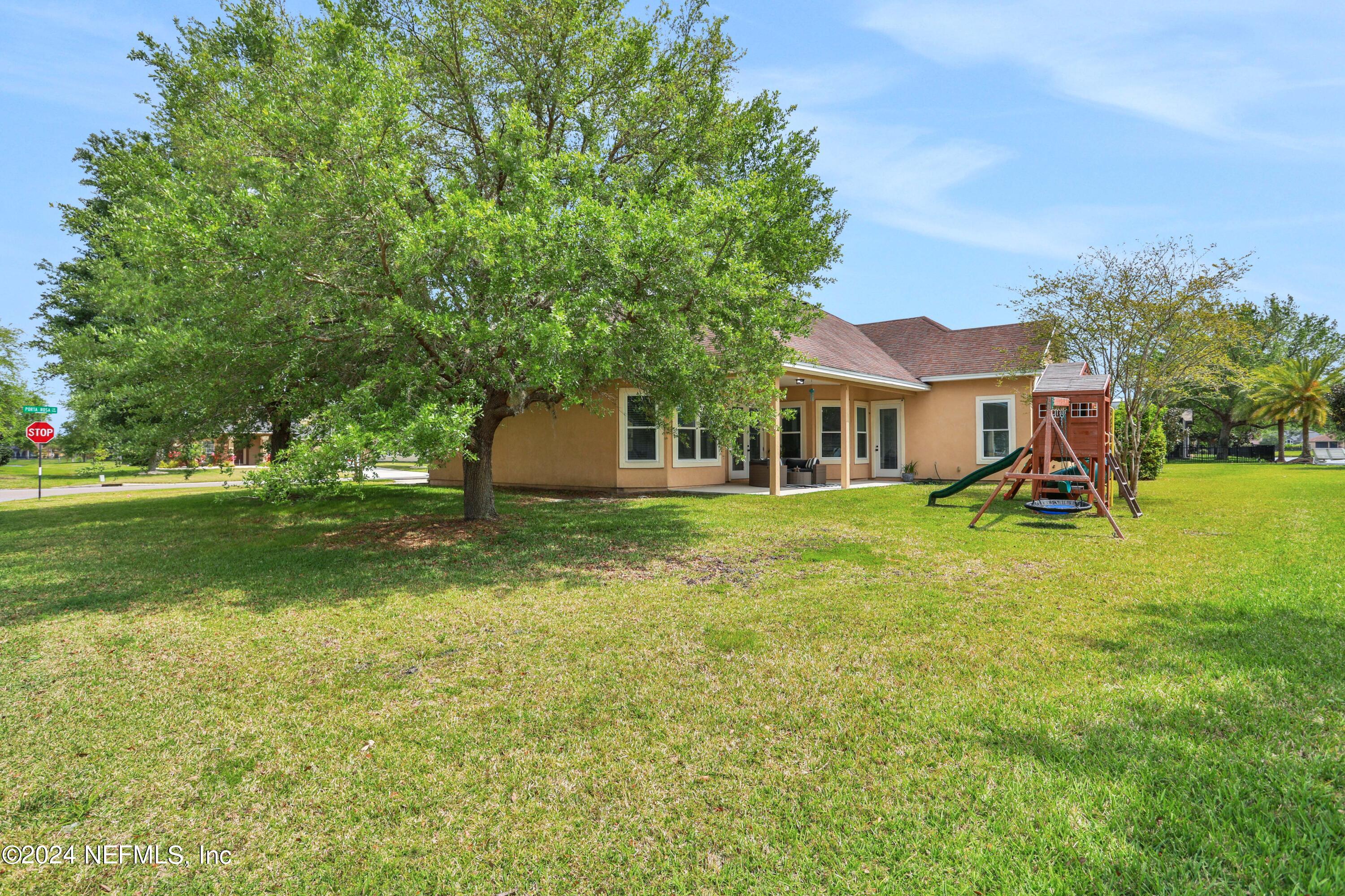 346 Porta Rosa Circle St. Augustine, FL 32092 - Photo 42 of 53 a house view with a garden space