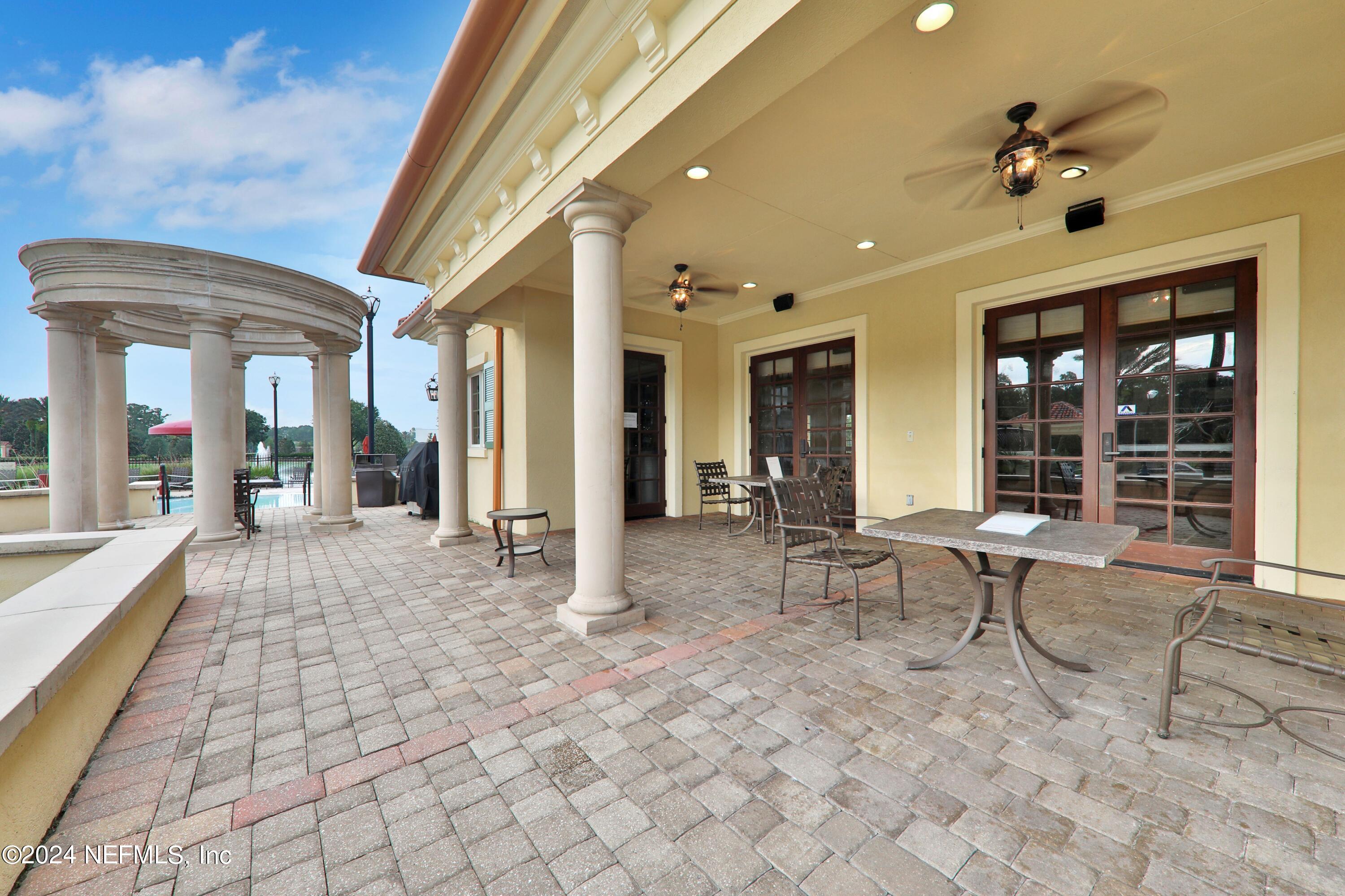 346 Porta Rosa Circle St. Augustine, FL 32092 - Photo 46 of 53 a view of an entryway with a table and chairs