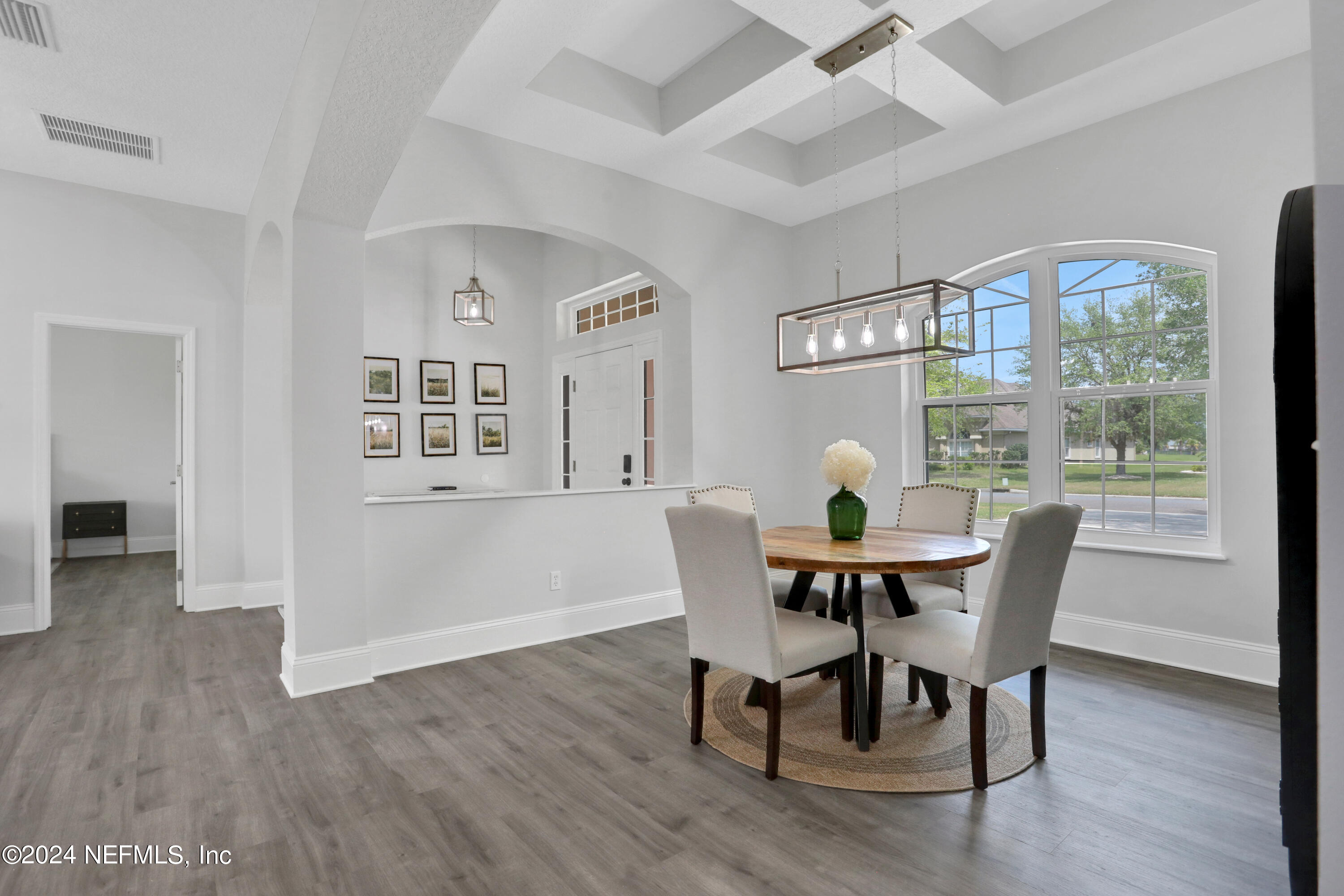 346 Porta Rosa Circle St. Augustine, FL 32092 - Photo 9 of 53 a view of a dining room with furniture window and wooden floor