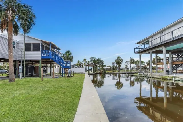 a view of a lake with a house