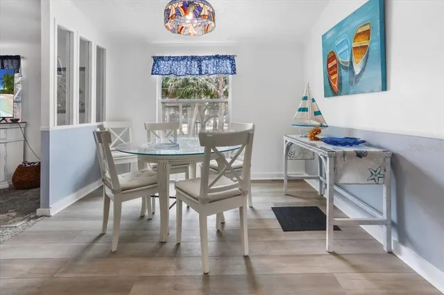 a view of a dining room with furniture
