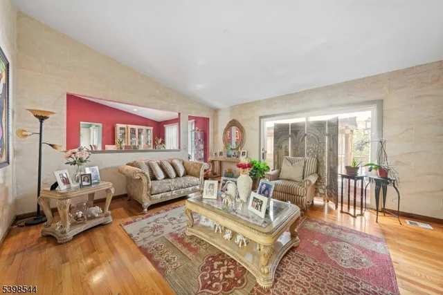 a living room with furniture and a table