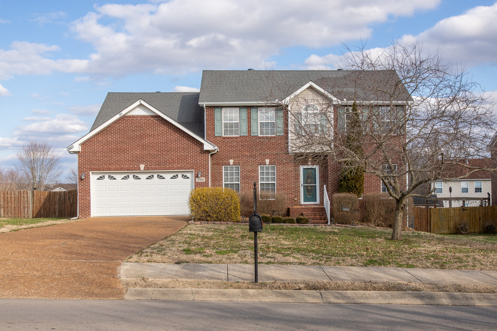 2918 Buckner Lane Spring Hill, TN 37174 - Photo 1 of 54 a front view of a house with a yard
