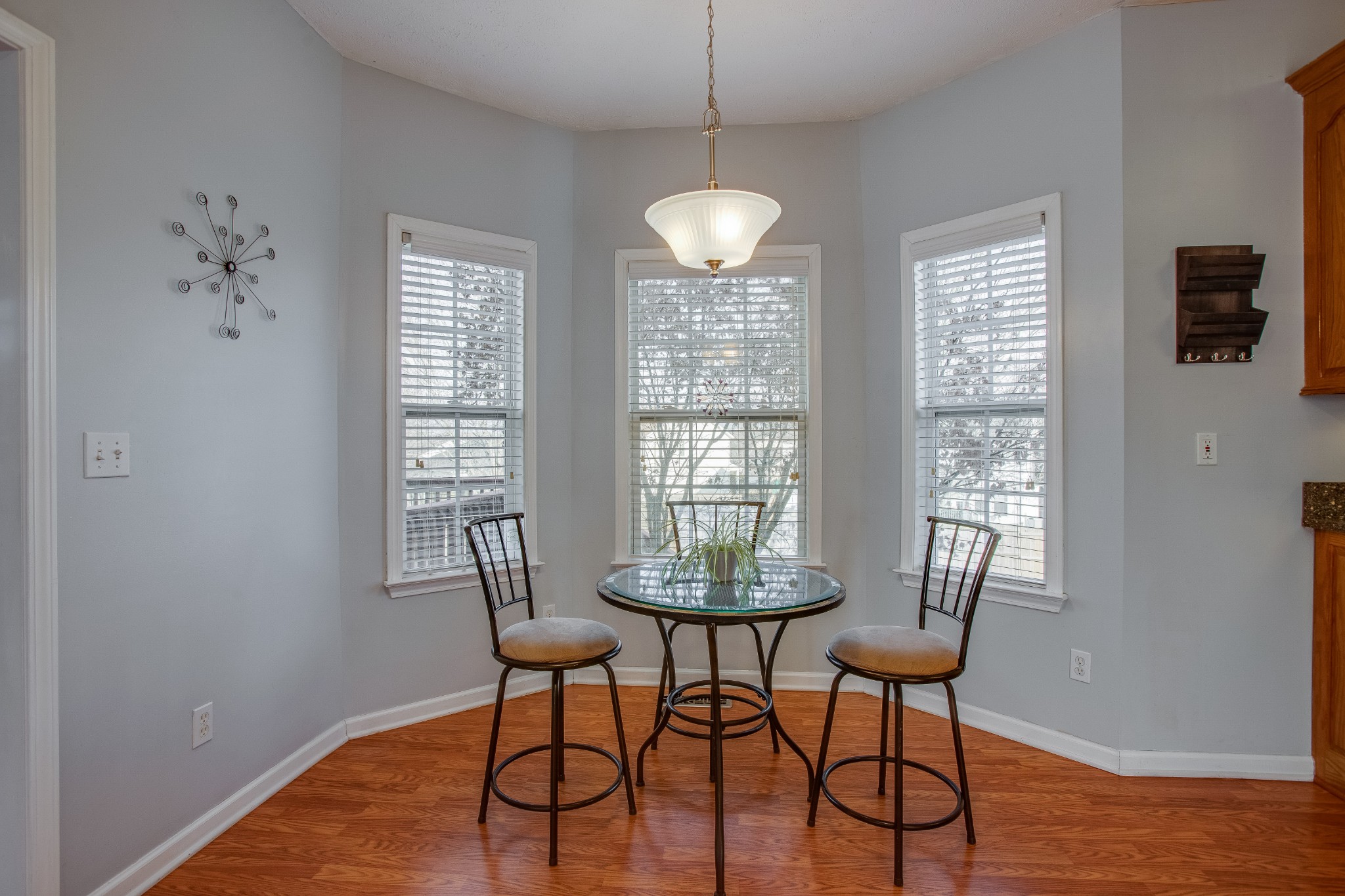 2918 Buckner Lane Spring Hill, TN 37174 - Photo 14 of 54 a view of a dining room with furniture window and wooden floor