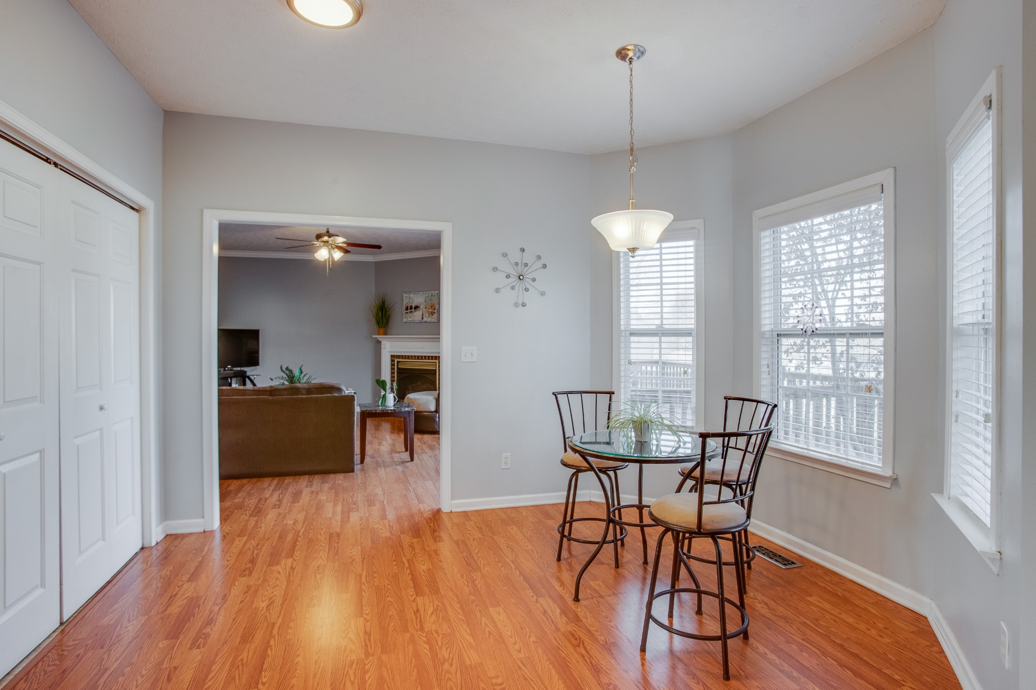 2918 Buckner Lane Spring Hill, TN 37174 - Photo 20 of 54 a view of a dining room with furniture window and wooden floor