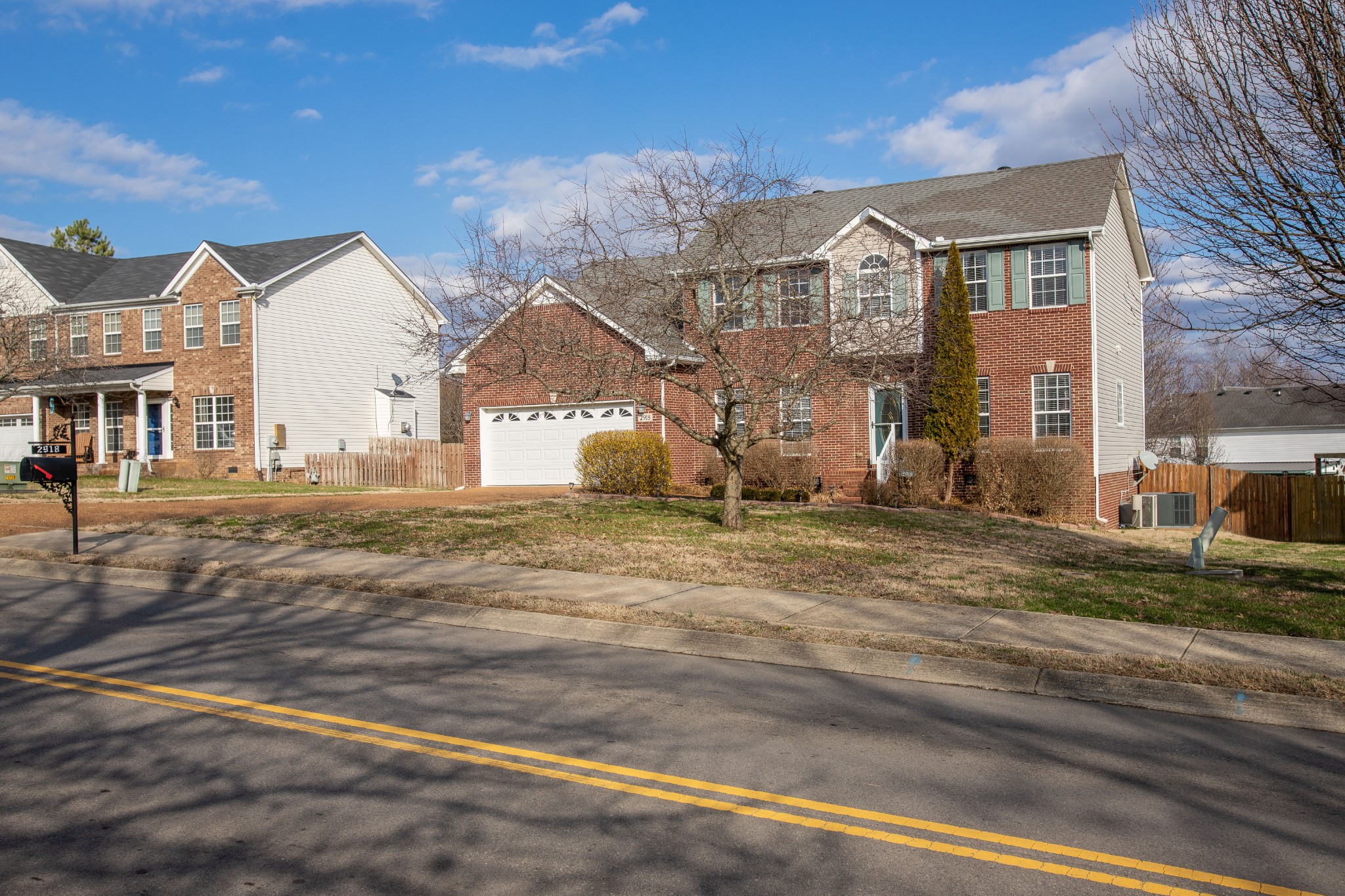 2918 Buckner Lane Spring Hill, TN 37174 - Photo 2 of 54 a front view of a house with a yard