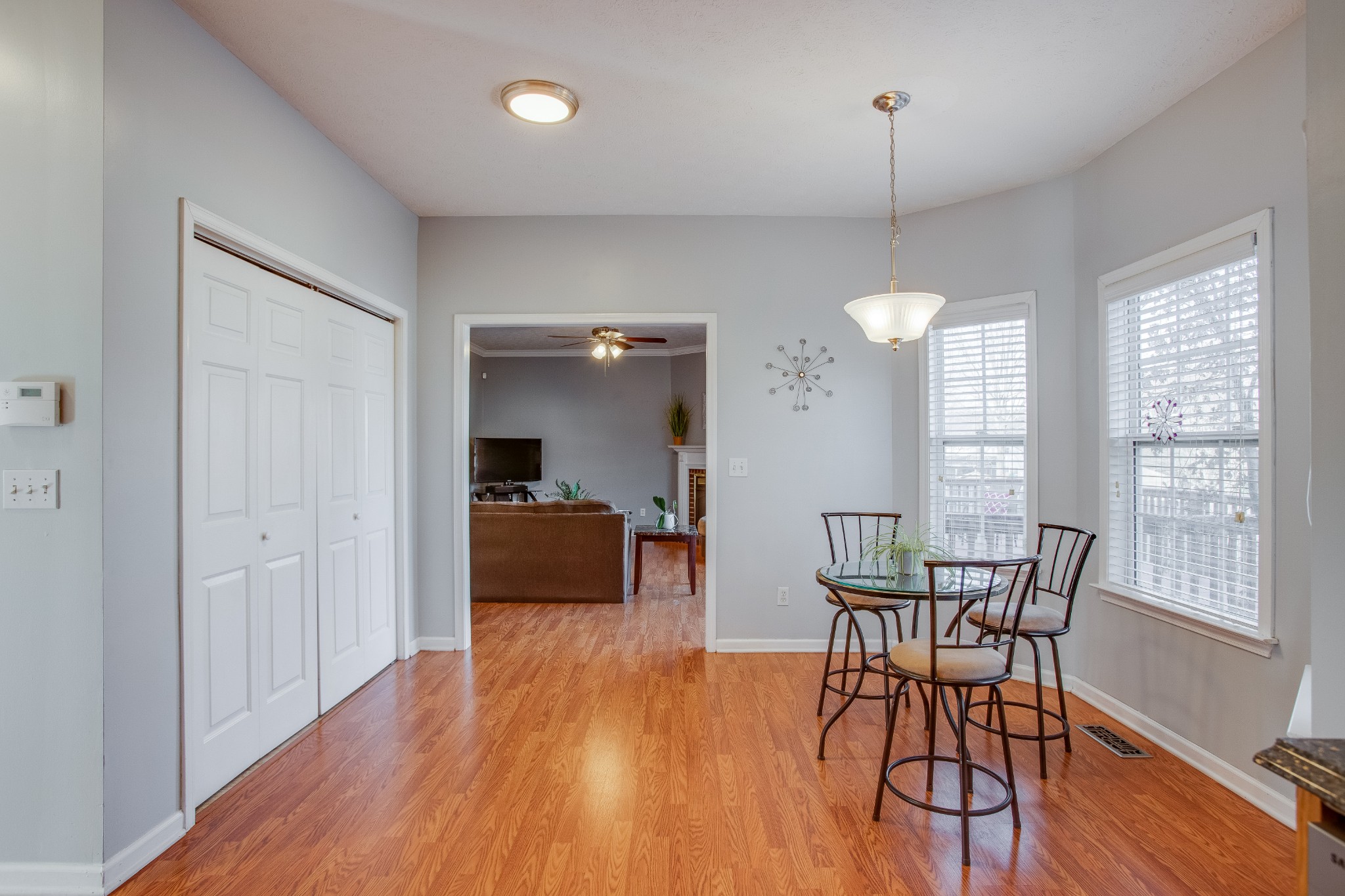 2918 Buckner Lane Spring Hill, TN 37174 - Photo 21 of 54 a view of a dining room with furniture window and wooden floor