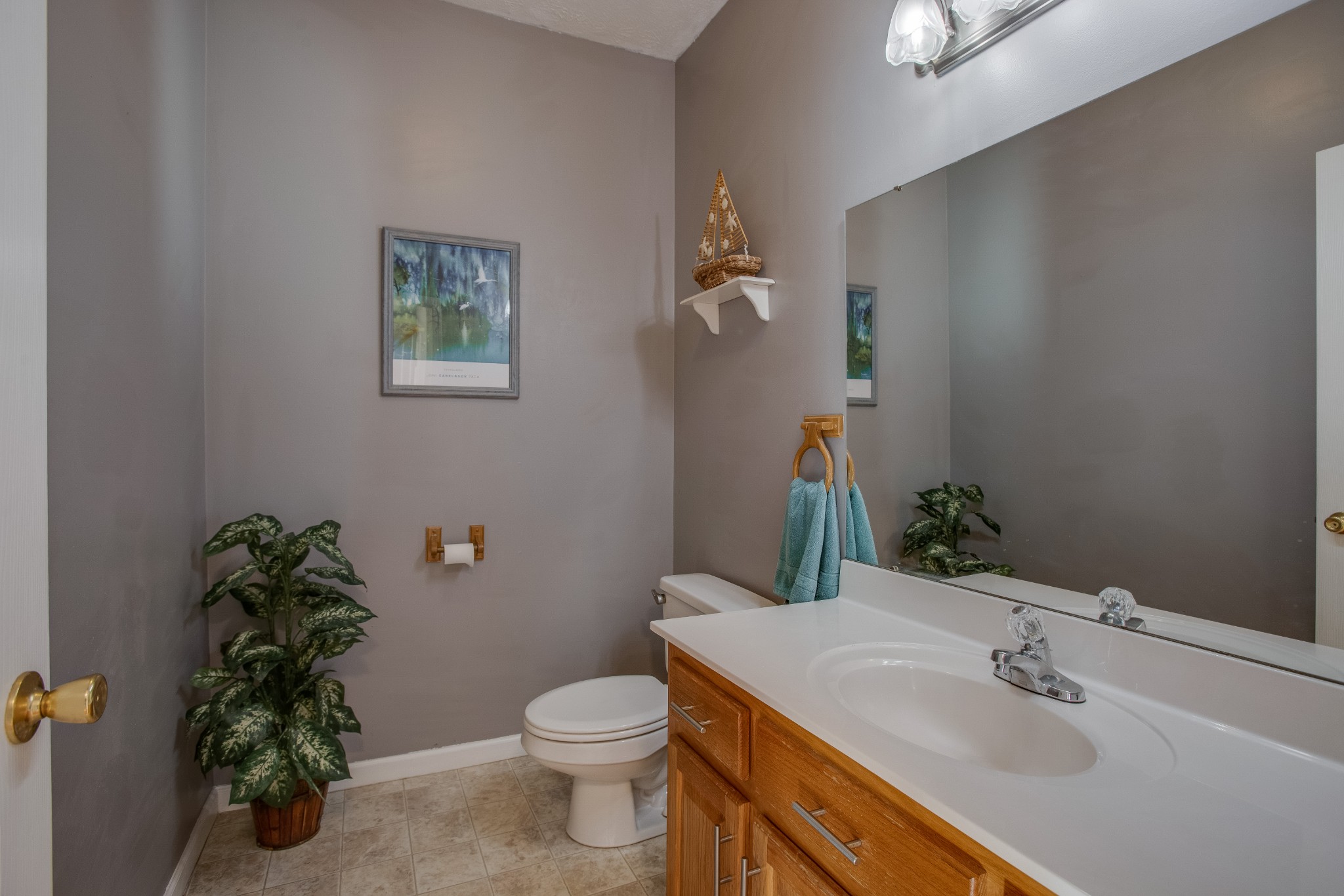 2918 Buckner Lane Spring Hill, TN 37174 - Photo 25 of 54 a bathroom with a sink toilet and vanity
