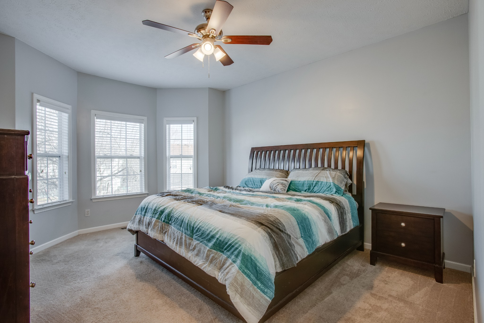 2918 Buckner Lane Spring Hill, TN 37174 - Photo 26 of 54 a spacious bedroom with a bed and a large window
