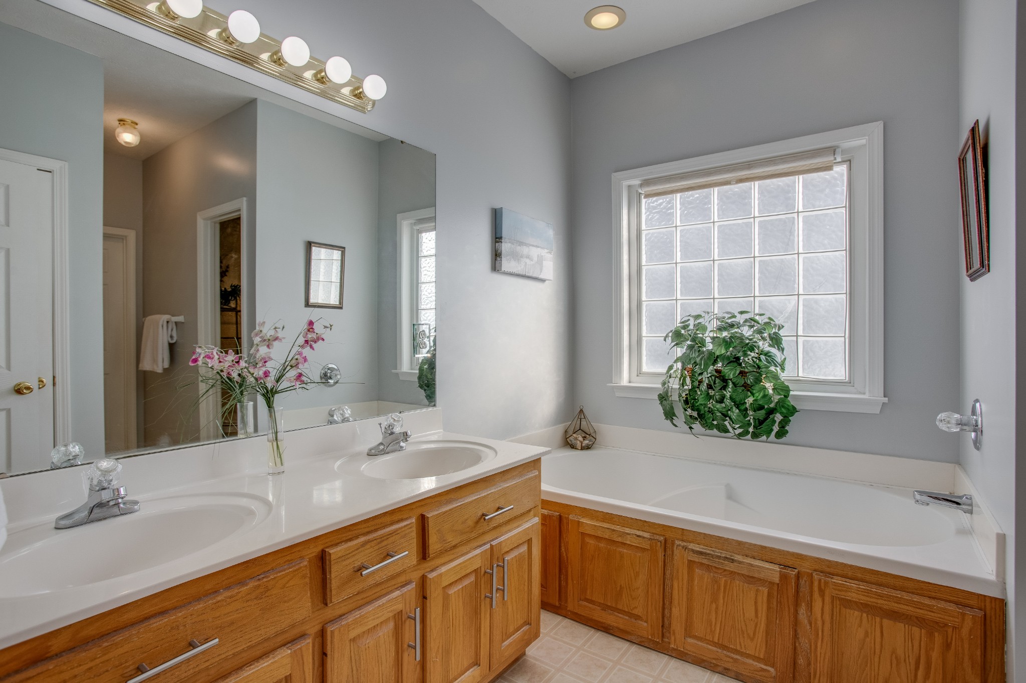 2918 Buckner Lane Spring Hill, TN 37174 - Photo 29 of 54 a bathroom with a sink and a mirror