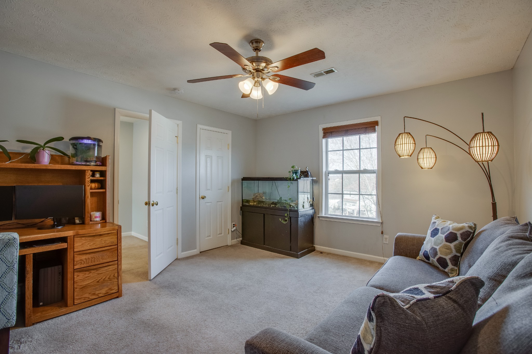 2918 Buckner Lane Spring Hill, TN 37174 - Photo 35 of 54 a living room with furniture and a flat screen tv