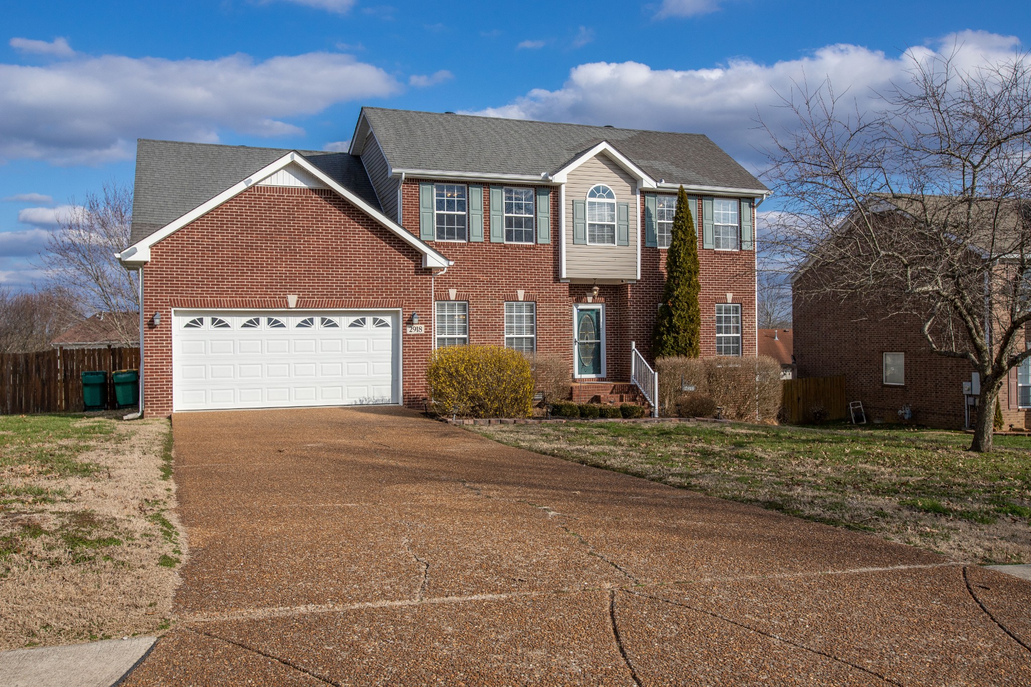 2918 Buckner Lane Spring Hill, TN 37174 - Photo 6 of 54 a front view of a house with a yard and garage