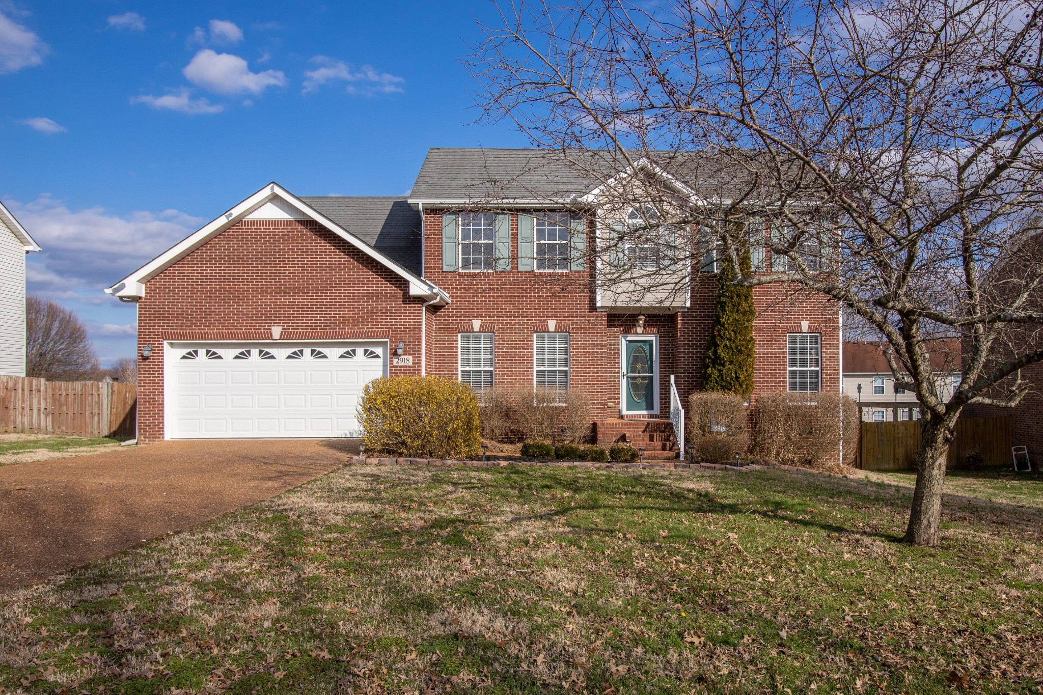 2918 Buckner Lane Spring Hill, TN 37174 - Photo 7 of 54 a front view of a house with a yard