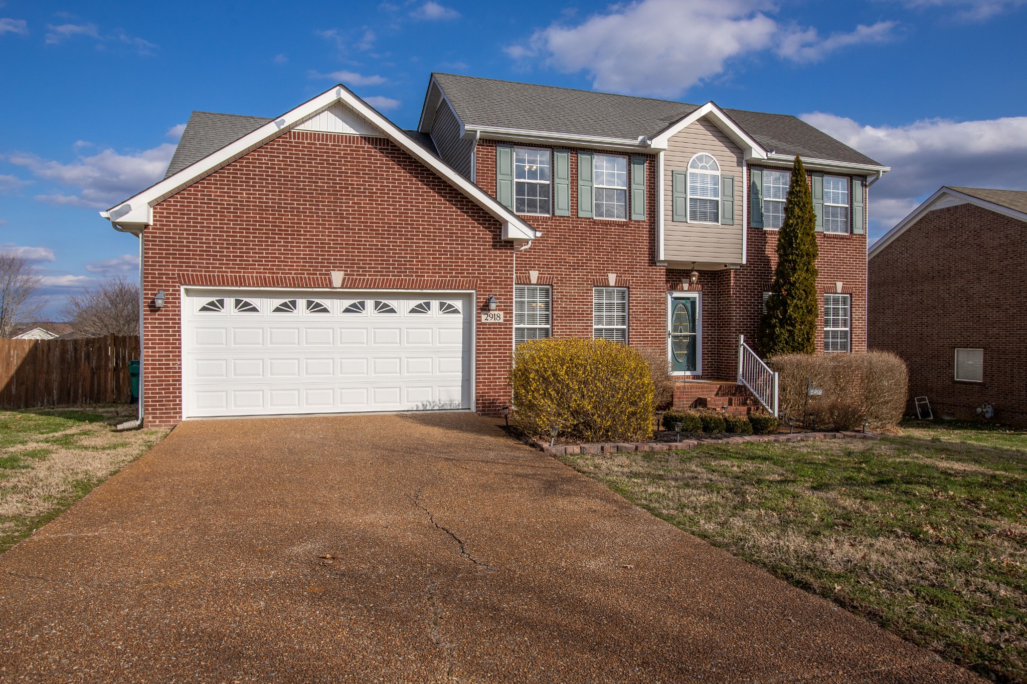 2918 Buckner Lane Spring Hill, TN 37174 - Photo 8 of 54 a front view of a house with a yard