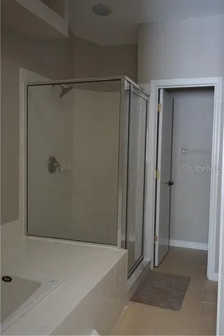 a bathroom with a sink and vanity