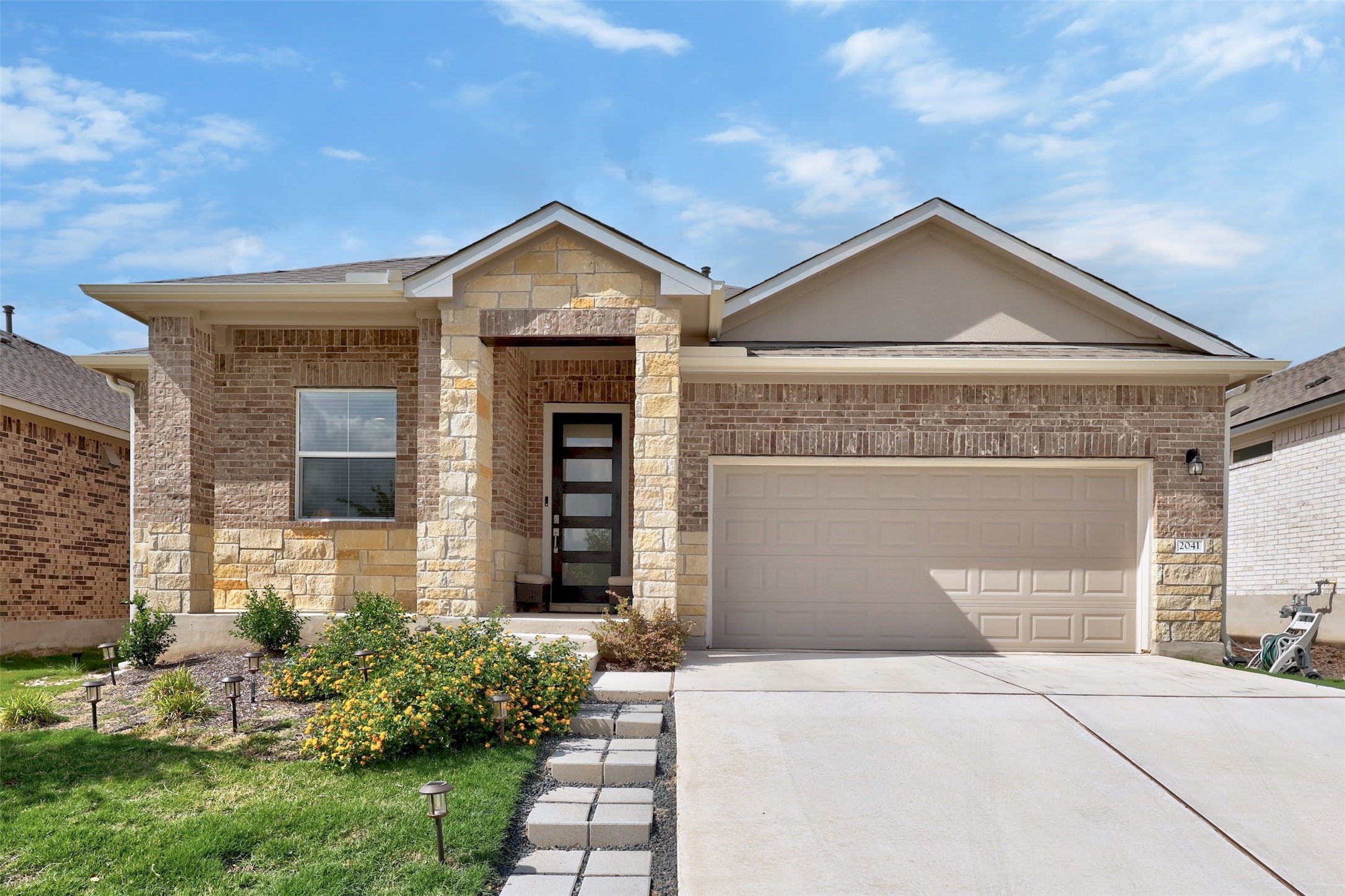 2041 Centerline Lane Georgetown, TX 78628 - Photo 2 of 31 front view of a house with a yard