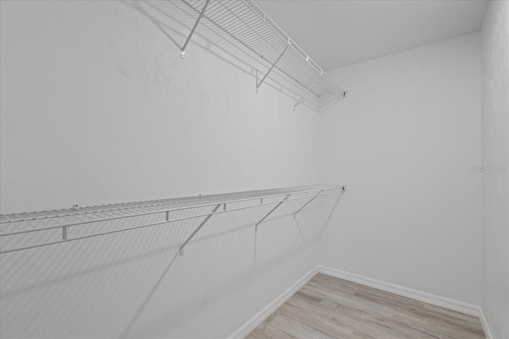 4899 Northwest 36th Street Bell, FL 32619 - Photo 18 of 67 a view of a room with racks on the wall