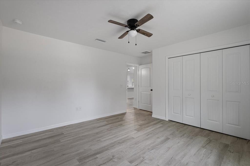 4899 Northwest 36th Street Bell, FL 32619 - Photo 22 of 67 wooden floor in an empty room