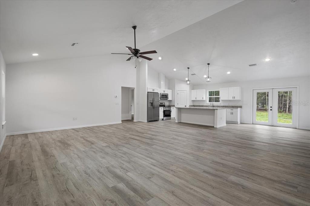 4899 Northwest 36th Street Bell, FL 32619 - Photo 7 of 67 a view of a kitchen with a sink and a window