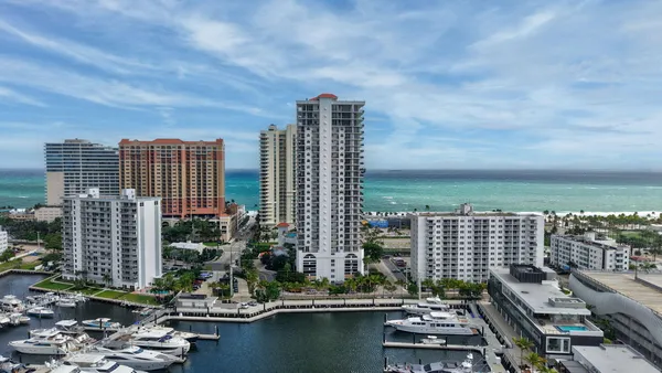 a view of a city with tall buildings