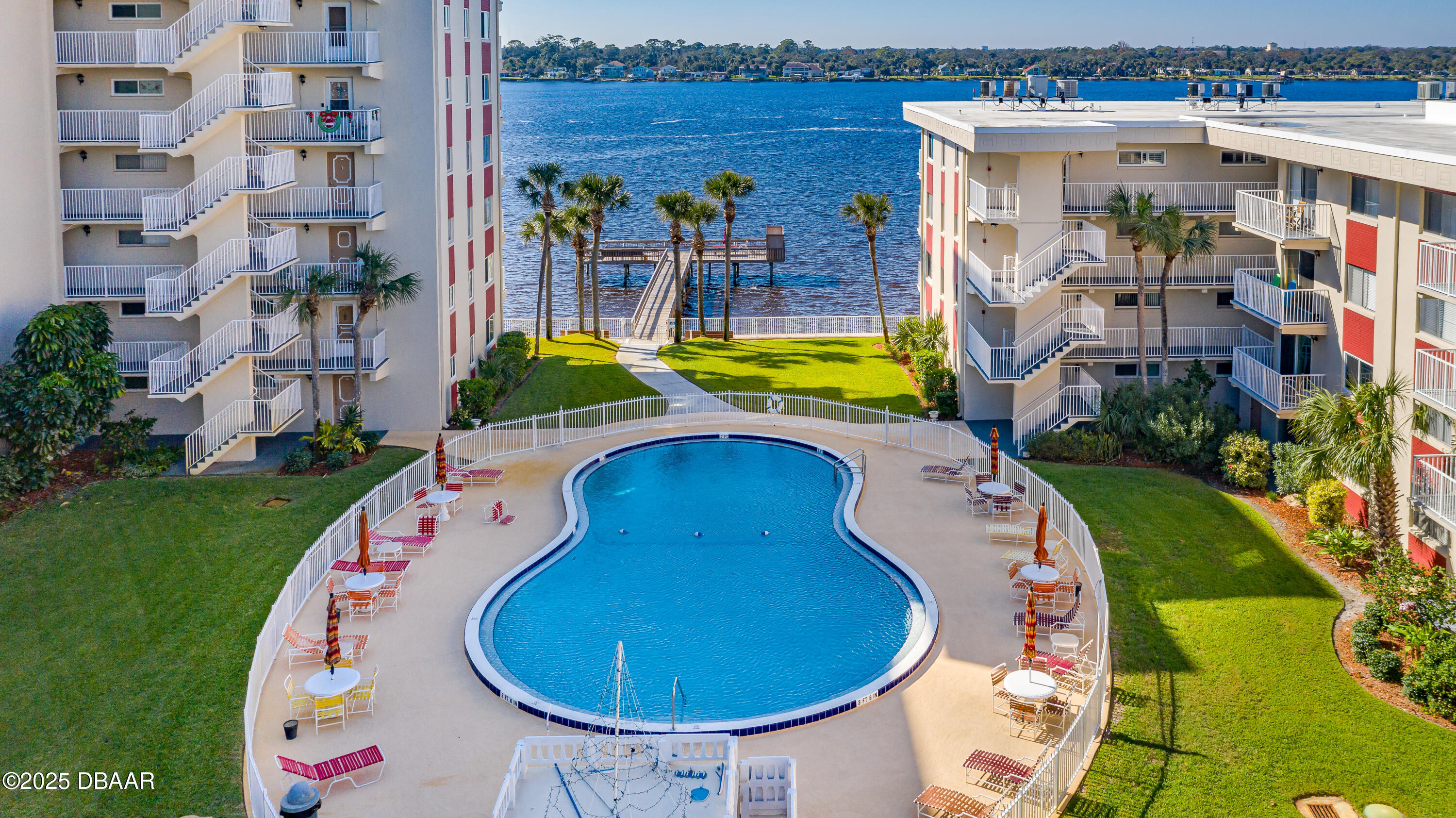 2711 North Halifax Avenue, Unit 288 Daytona Beach, FL 32118 - Photo 1 of 35 an aerial view of a swimming pool