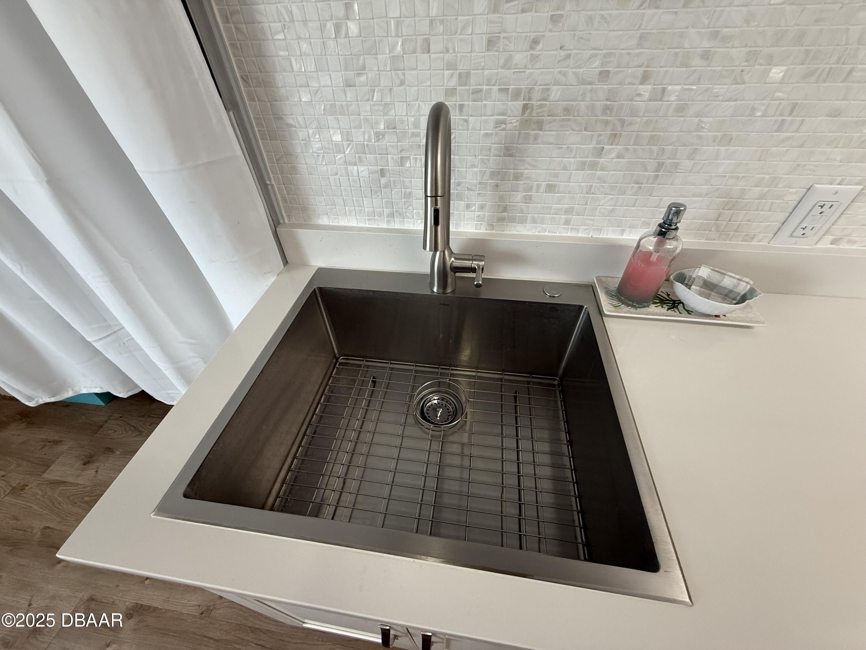 2711 North Halifax Avenue, Unit 288 Daytona Beach, FL 32118 - Photo 11 of 35 a bathroom with a sink