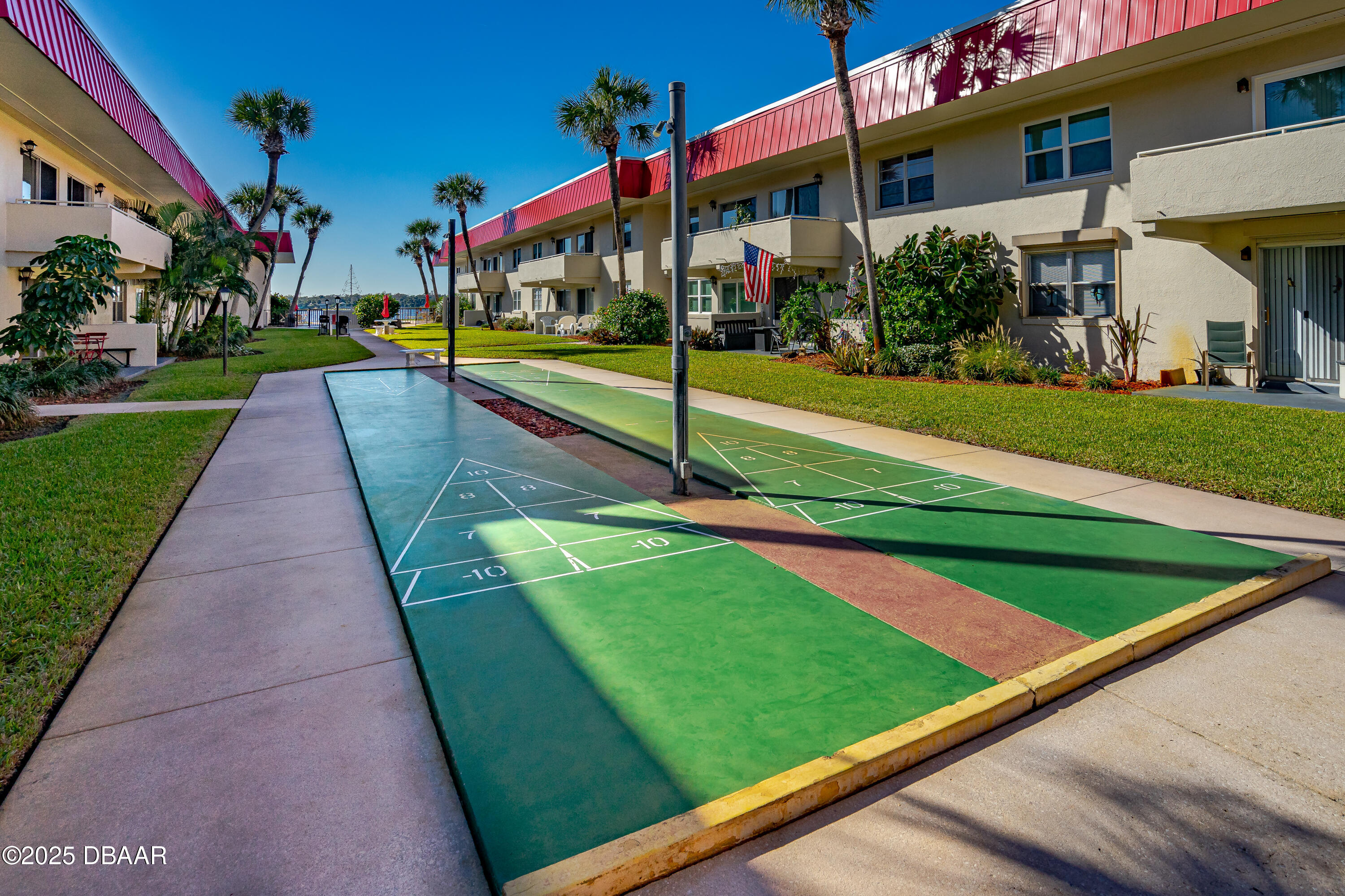 2711 North Halifax Avenue, Unit 288 Daytona Beach, FL 32118 - Photo 23 of 35 a view of a volley ball court