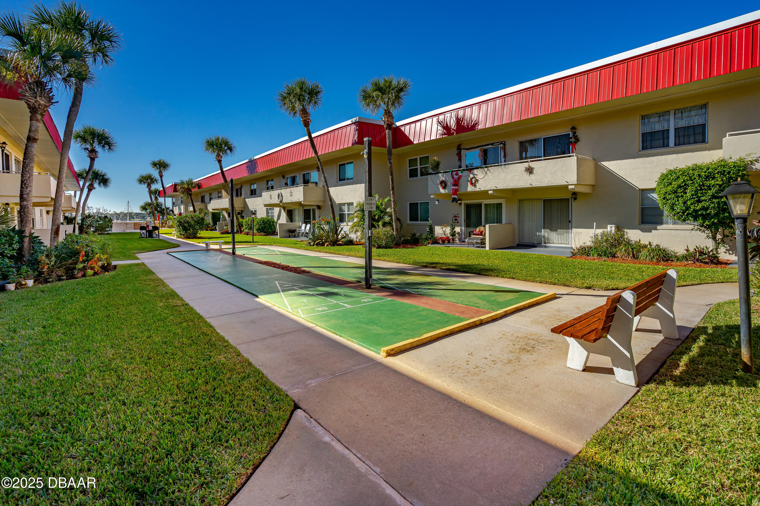 2711 North Halifax Avenue, Unit 288 Daytona Beach, FL 32118 - Photo 25 of 35 a view of a volley ball court