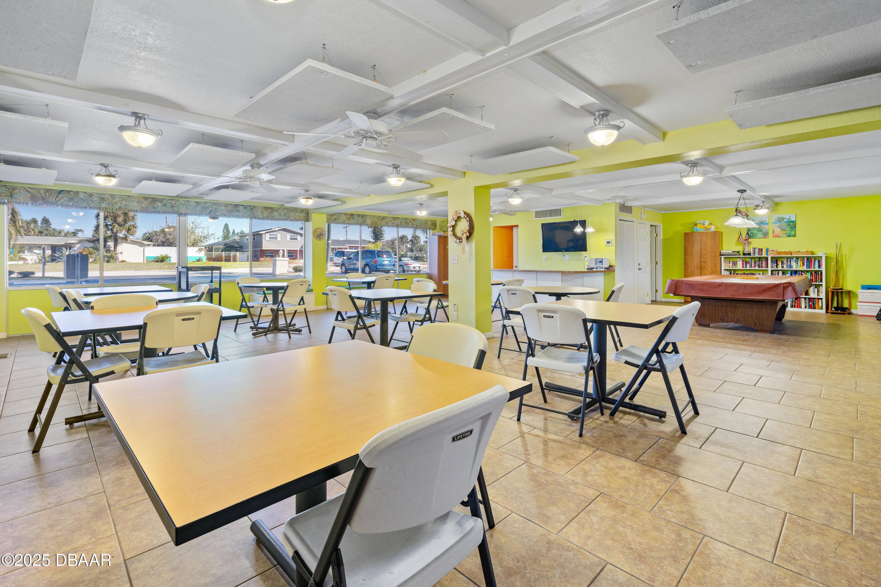 2711 North Halifax Avenue, Unit 288 Daytona Beach, FL 32118 - Photo 34 of 35 a view of a dining room with furniture
