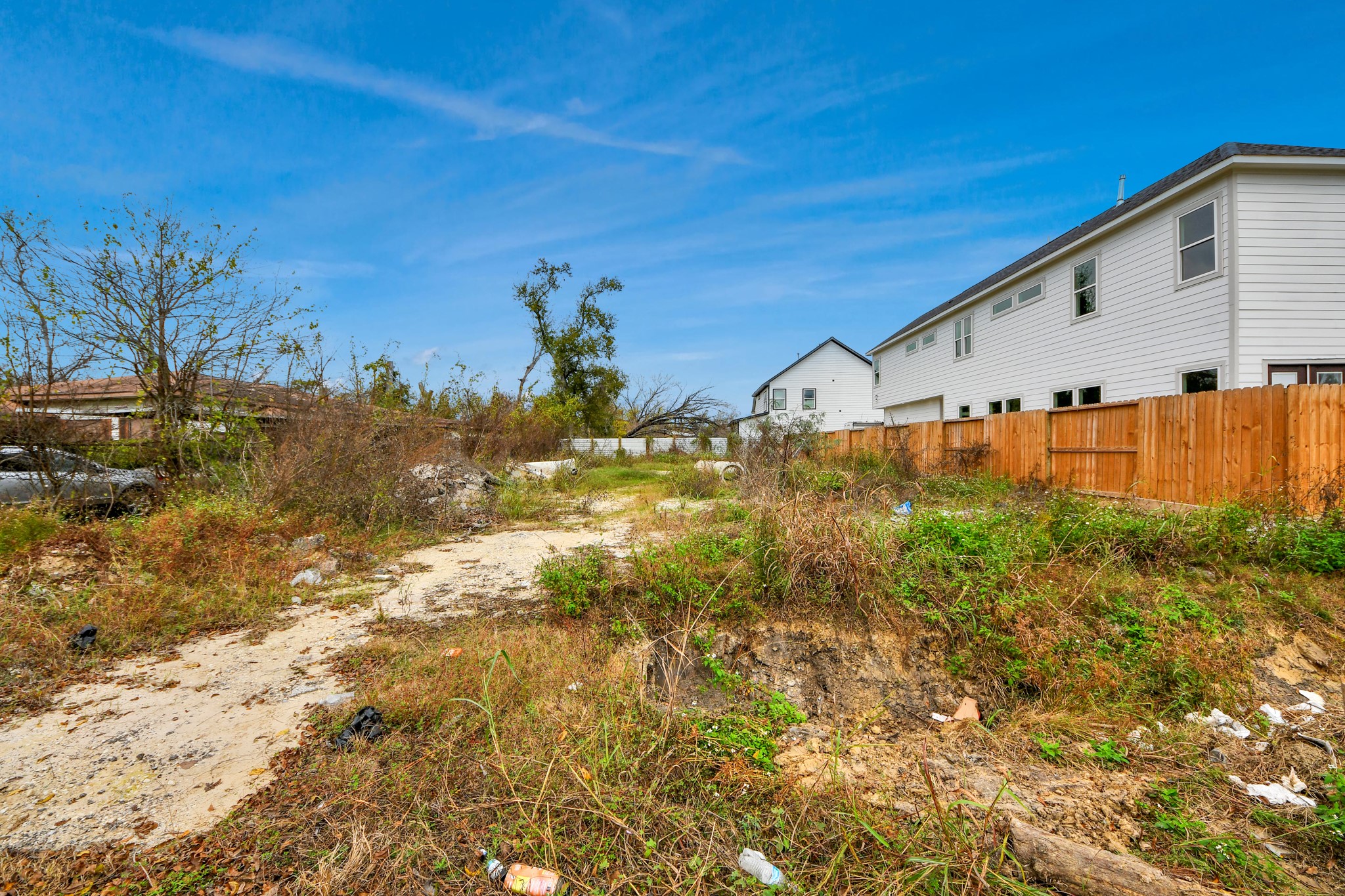 4121 East Toliver Street Houston, TX 77016 - Photo 6 of 34 a front view of a house with garden