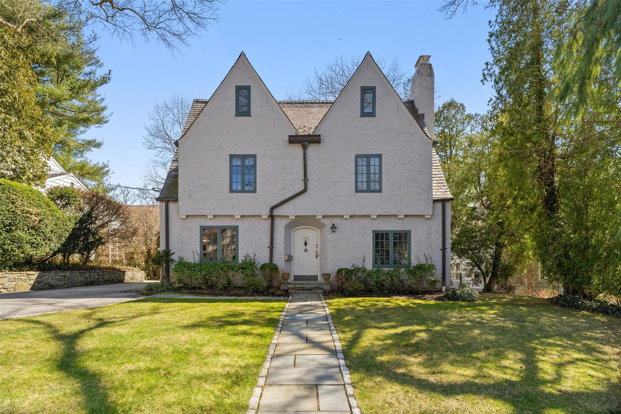 a front view of house with yard