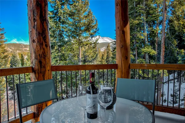 a view of balcony with furniture