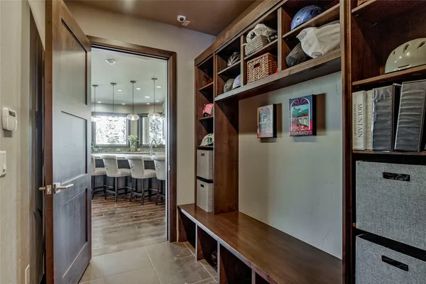 a view of a living room and entry way