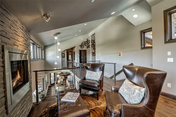 a bedroom with a bed and a lamp on table