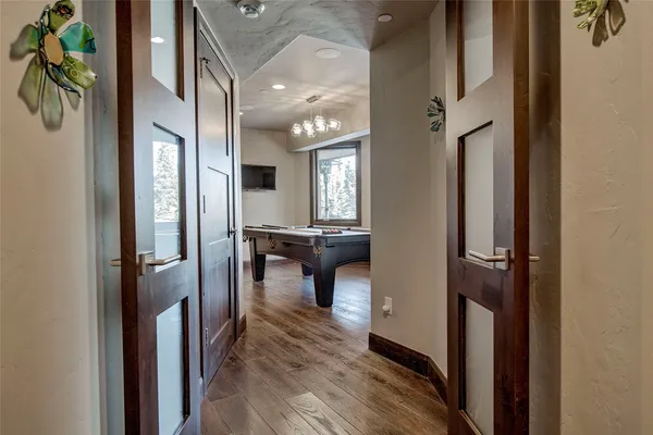 a bedroom with a bed couch and window