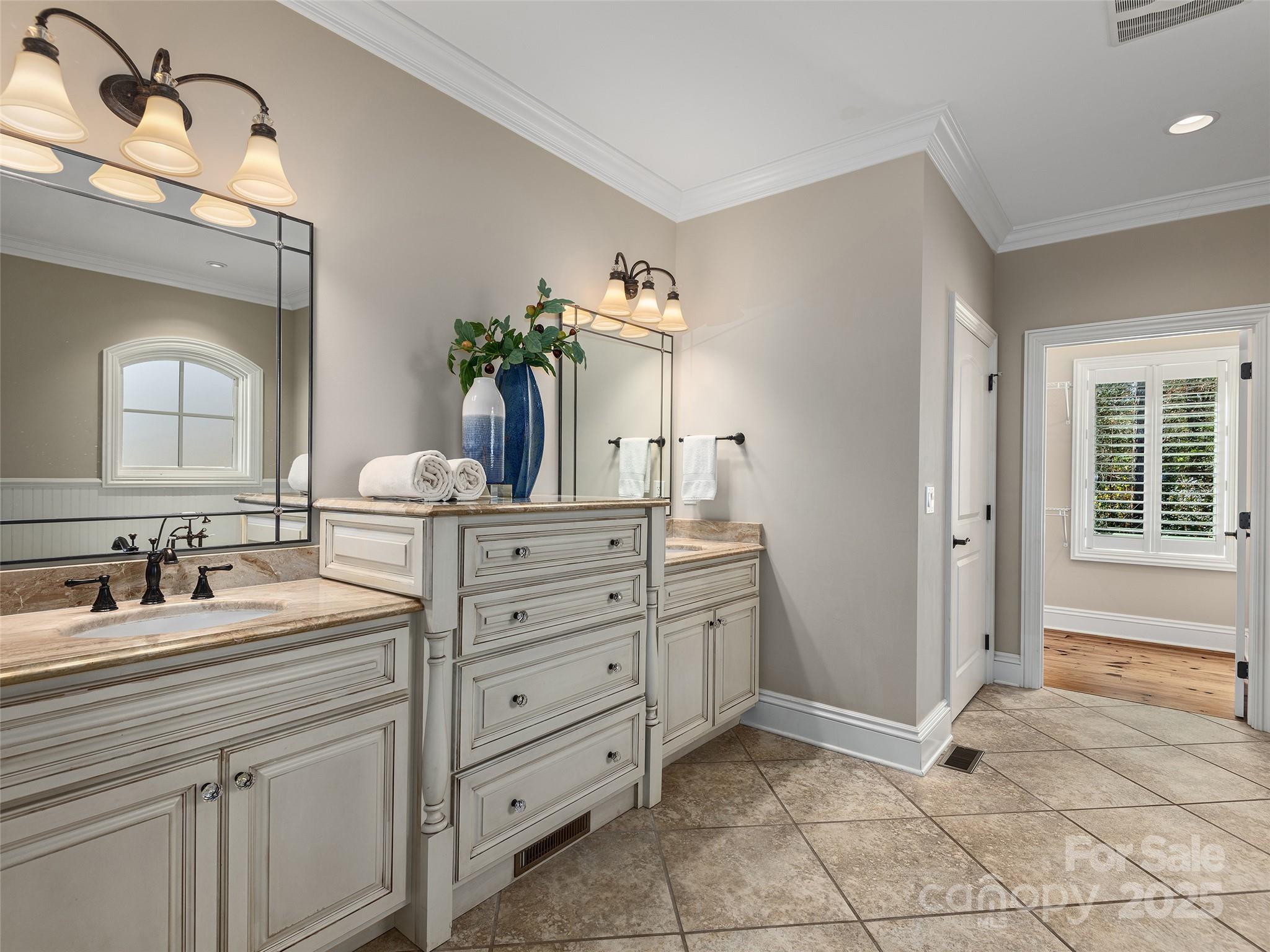 2514 Oakdale Road Old Fort, NC 28762 - Photo 20 of 48 a bathroom with a sink and a mirror