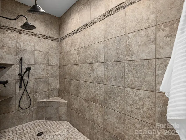 a bathroom with a glass shower