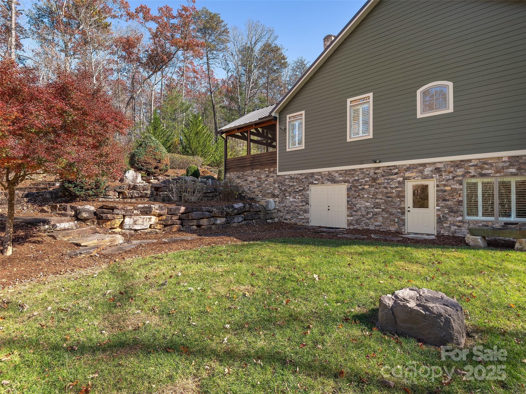 2514 Oakdale Road Old Fort, NC 28762 - Photo 41 of 48 a front view of a house with garden