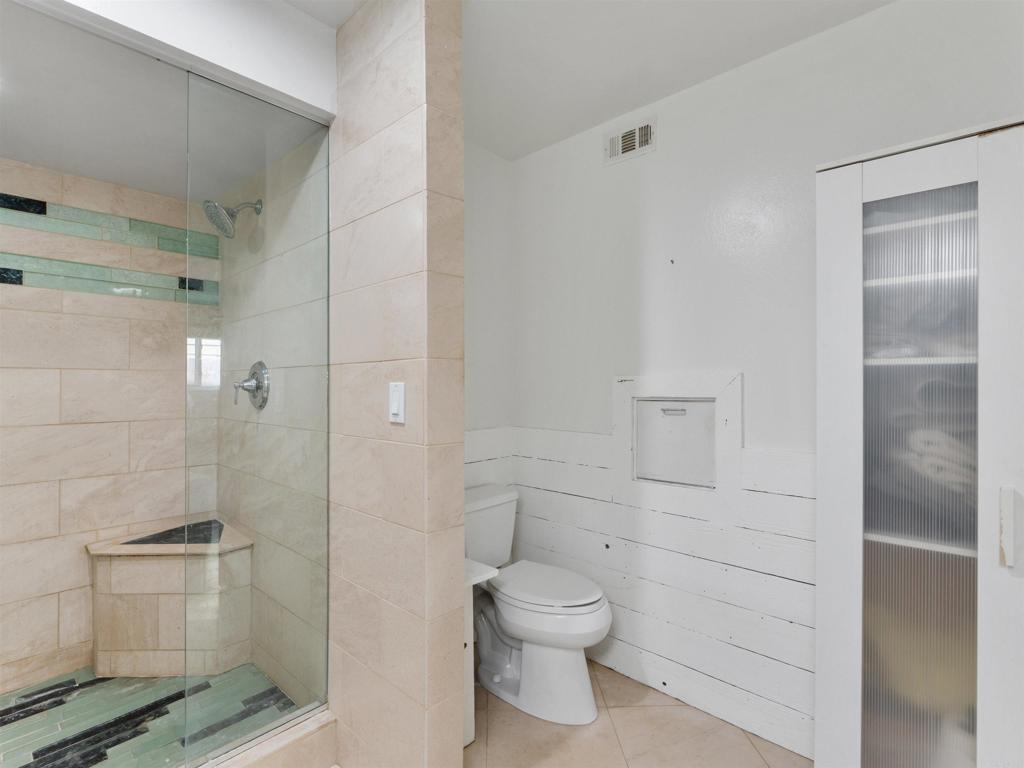 852 Dewitt Avenue Encinitas, CA 92024 - Photo 20 of 41 a bathroom with a toilet and a shower