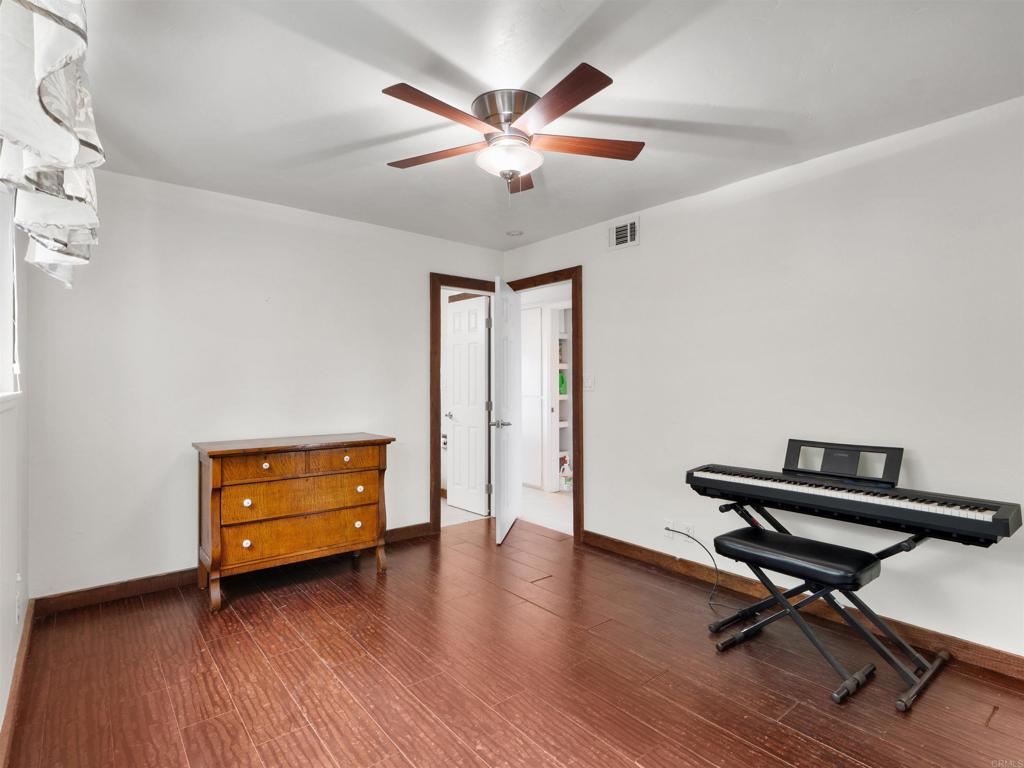 852 Dewitt Avenue Encinitas, CA 92024 - Photo 25 of 41 a view of room with hardwood floor and ceiling fan